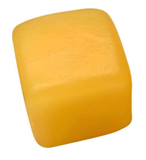 Close-up of a yellow cube-shaped gummy showing its front and side.